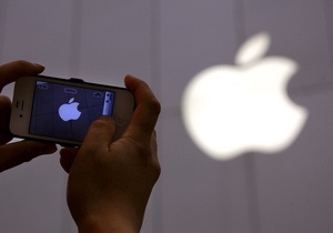 Корпорация Apple - Почти треть акционеров Apple отказалась одобрить выплату вознаграждения руководству компании