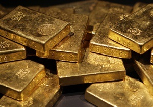 Золото дешевшає через побоювання за зростання світової економіки
