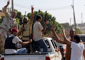 У бастіоні Каддафі, за який ідуть бої, заблоковано 1200 іммігрантів
