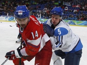 Хоккей: Расчетливые финны выходят в полуфинал