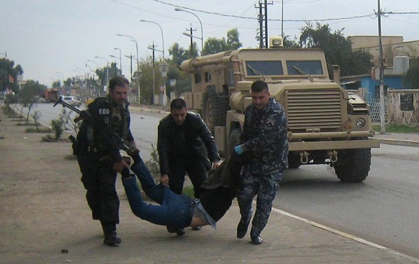 Волна насилия в Ираке не утихает. В родном городе Хусейна боевики захватили мэрию