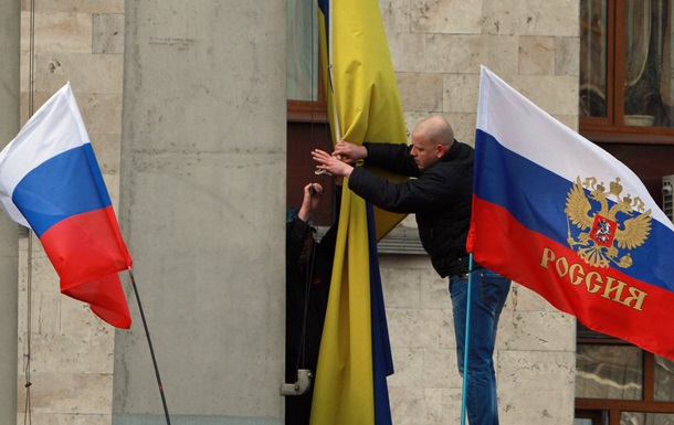 Восточную Украину охватила  война флагов  – КоммерсантЪ
