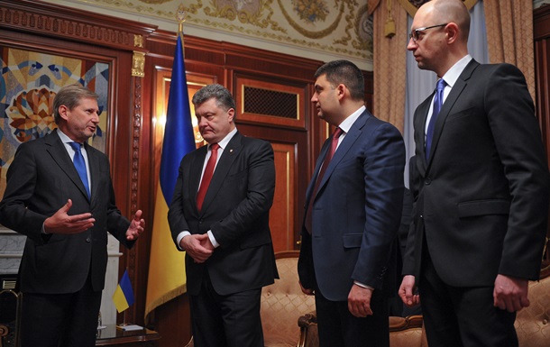 Еврокомиссар Хан в Киеве: Символический визит, но не больше