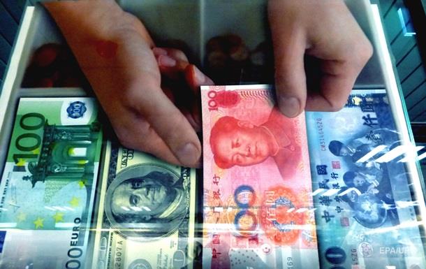 Точка зору: Як вплине на фінансову ситуацію визнання юаня резервною валютою