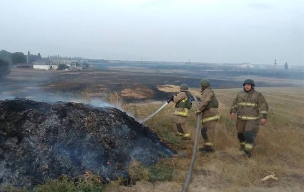 Пожар на военном складе под Мариуполем потушили