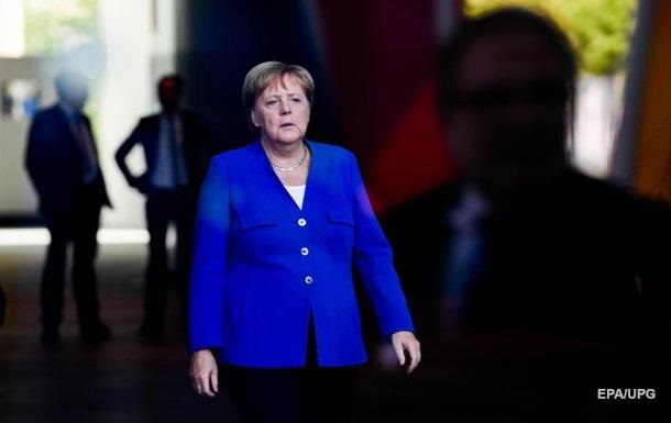 Меркель вперше відвідає Освенцим