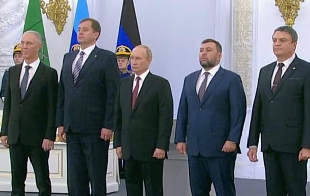 Путин подписал договоры о `присоединении` украинских регионов к РФ