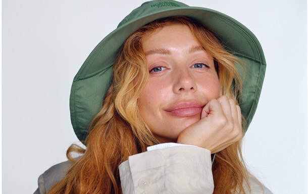 Tina Karol without makeup poses for the cover of ELLE