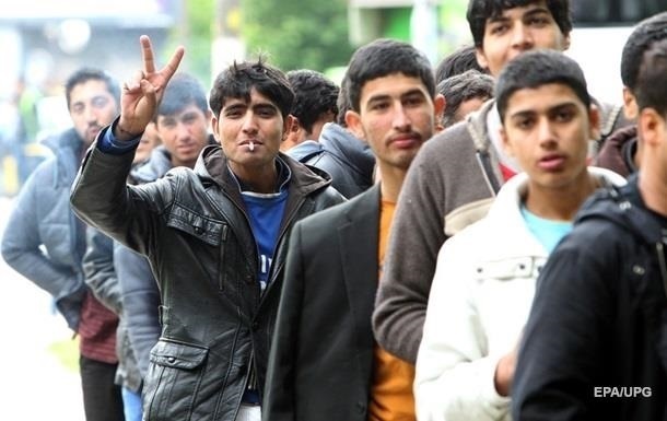 Парламент Британии принял законопроект о депортации мигрантов