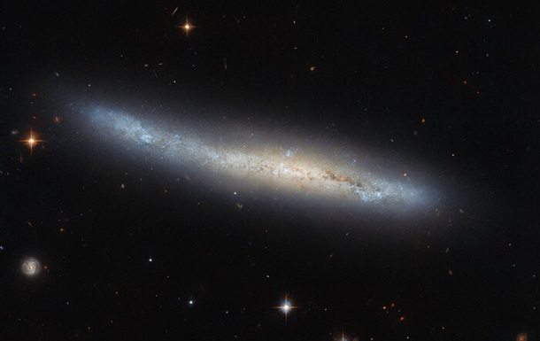 Телескоп Hubble зафиксировал спиральную галактику в созвездии Девы